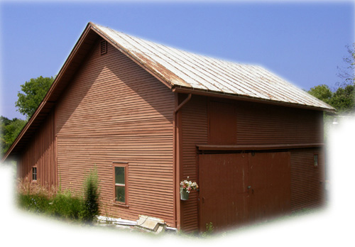 630 x 40' Clapboard Barn including west extension for storage or parking.